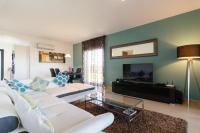 Two bedroom ground floor apartment with large private garden and pool