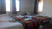 Dreibettzimmer mit Balkon