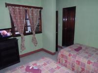 Camera Doppia con Letti Singoli e Bagno in Comune