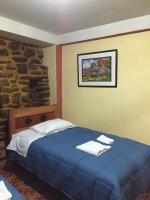 Camera Familiare con Bagno in Comune