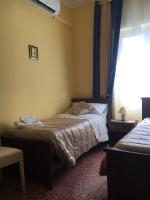 Camera Deluxe Doppia con Letti Singoli