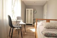 Tweepersoonskamer met 2 Aparte Bedden en Eigen Badkamer