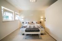 Kamer met 1 Groot Bed of 2 Aparte Bedden en Uitzicht op de Stad