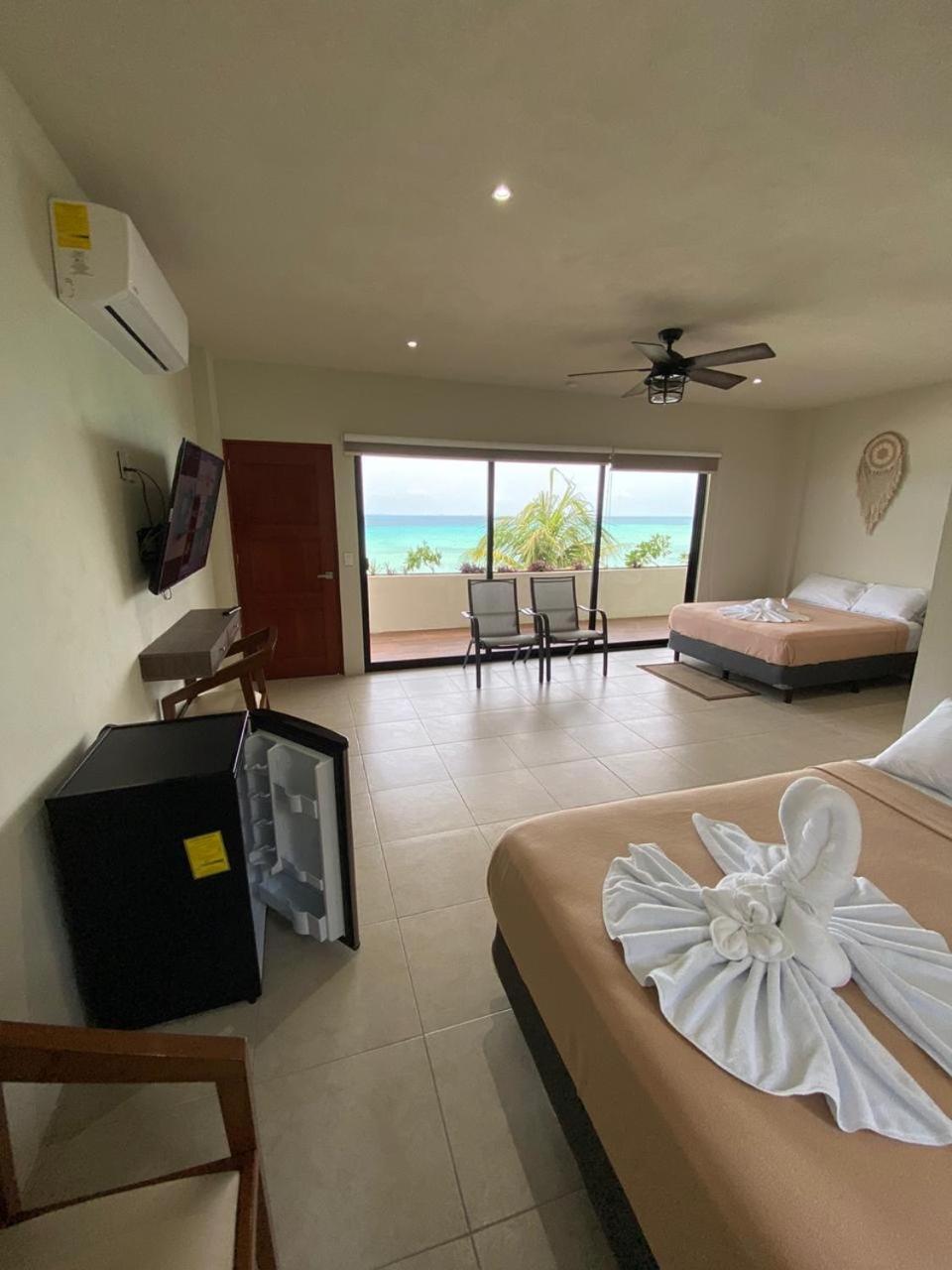 Cuxos Hotel Beachfront, foto 9