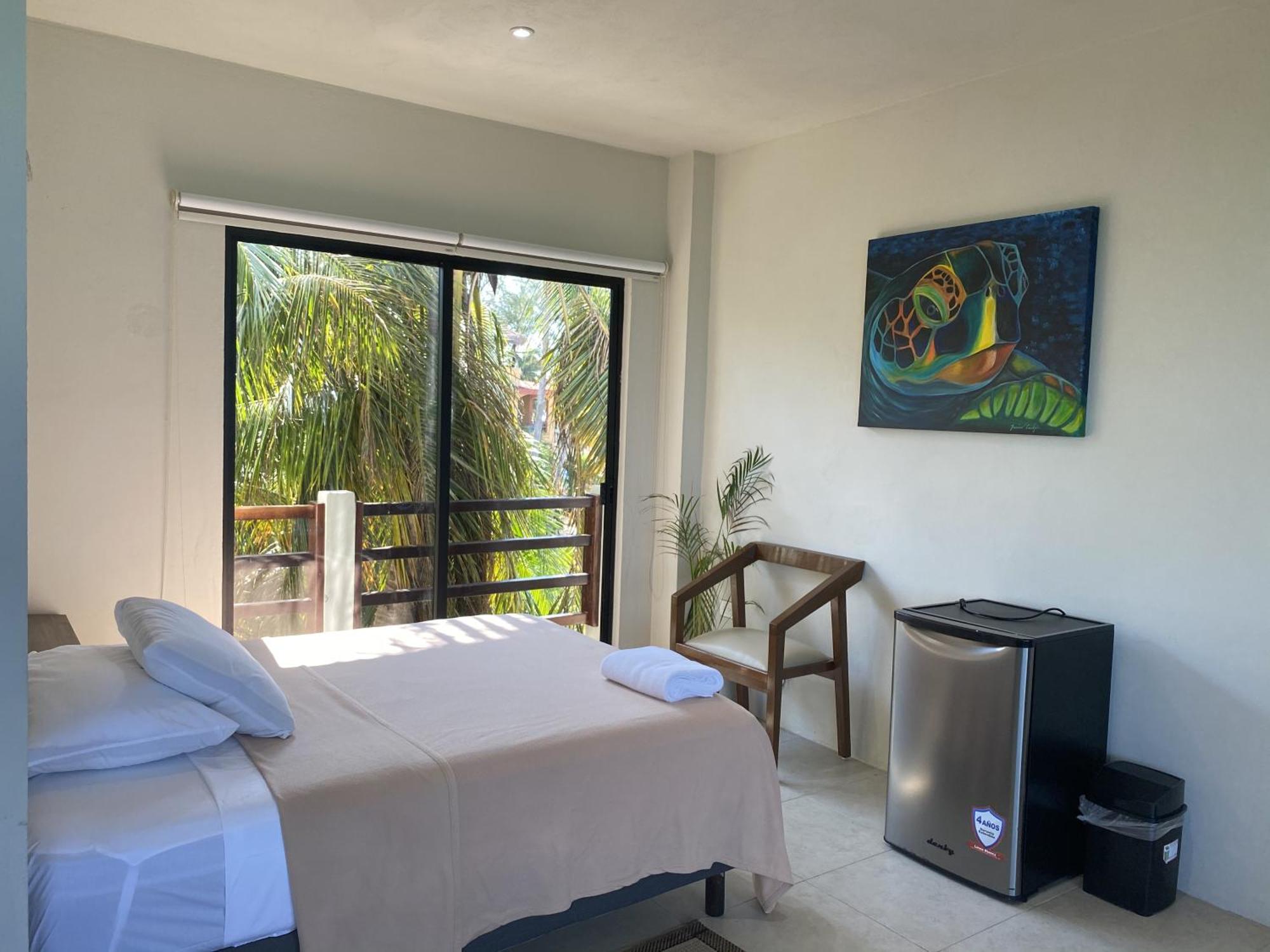 Cuxos Hotel Beachfront, foto 12