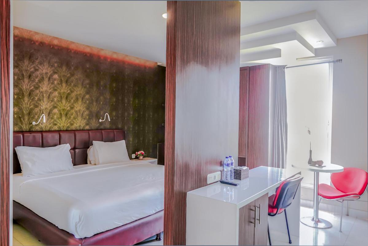 Empress Hotel Makassar City Center by LIFE — foto 4