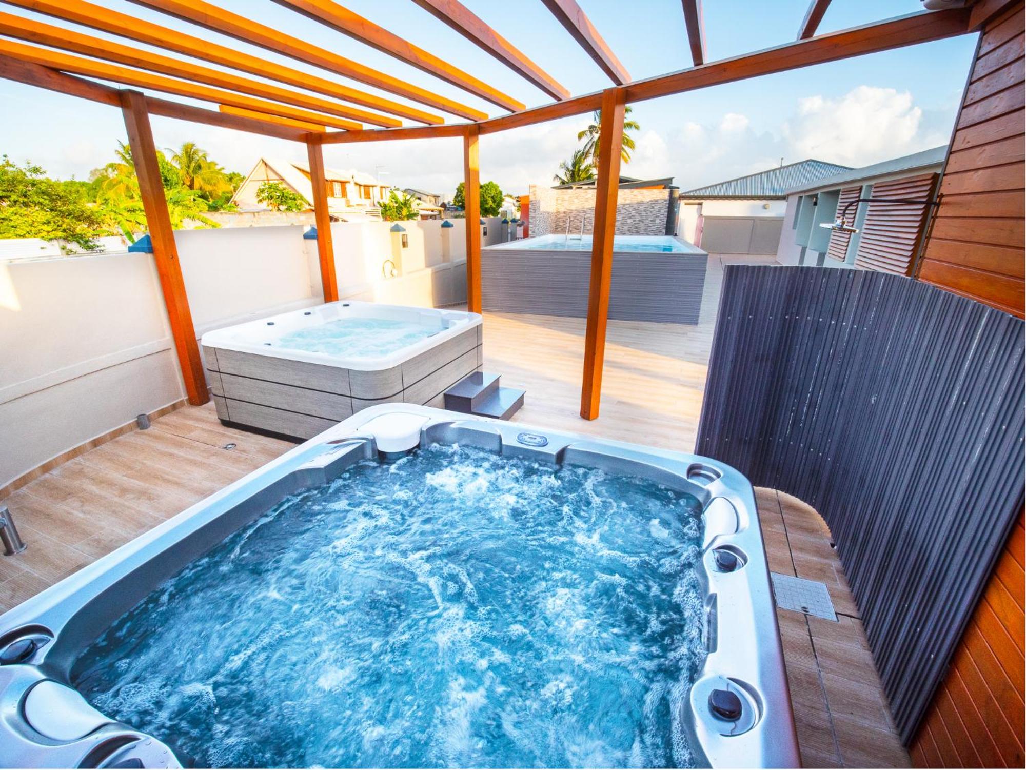 Évasion en Plein Cœur de Port-Louis Studio avec Piscine, Jacuzzis, Sauna, Tapas & Mocktails, foto 7