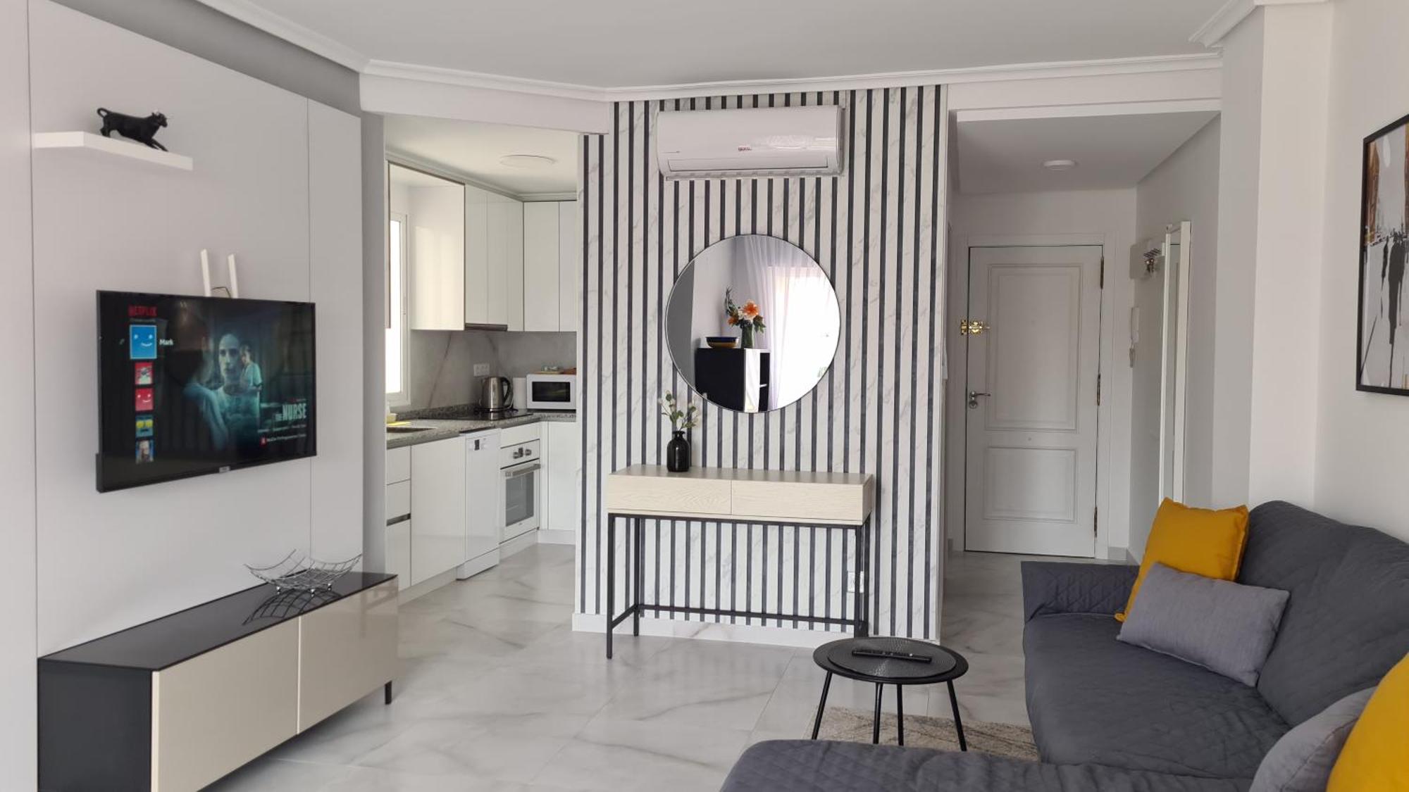 lovely sunny apartment with shared pool and private parking