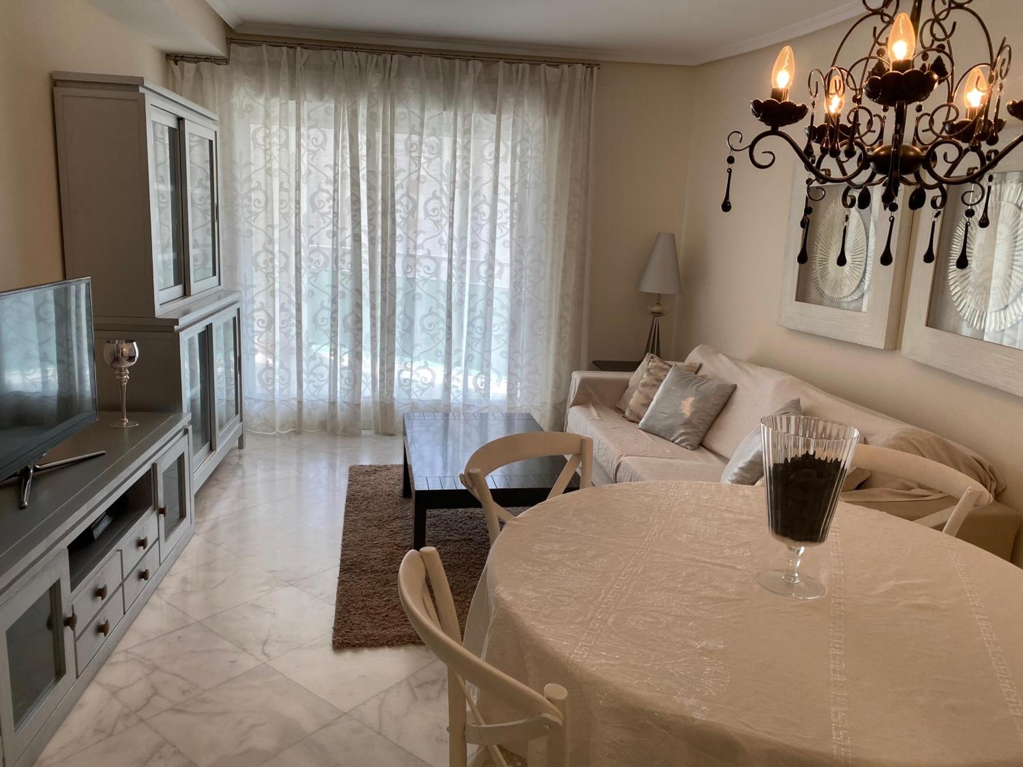 Elegant 2-Bedroom Apartment in Benidorm with Private Pool and Scenic Garden Views