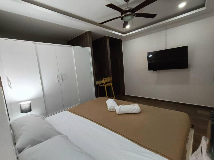 Moderno 1BR sauna gimnasio alberca a cuadras de la 5ta av centro, foto 11