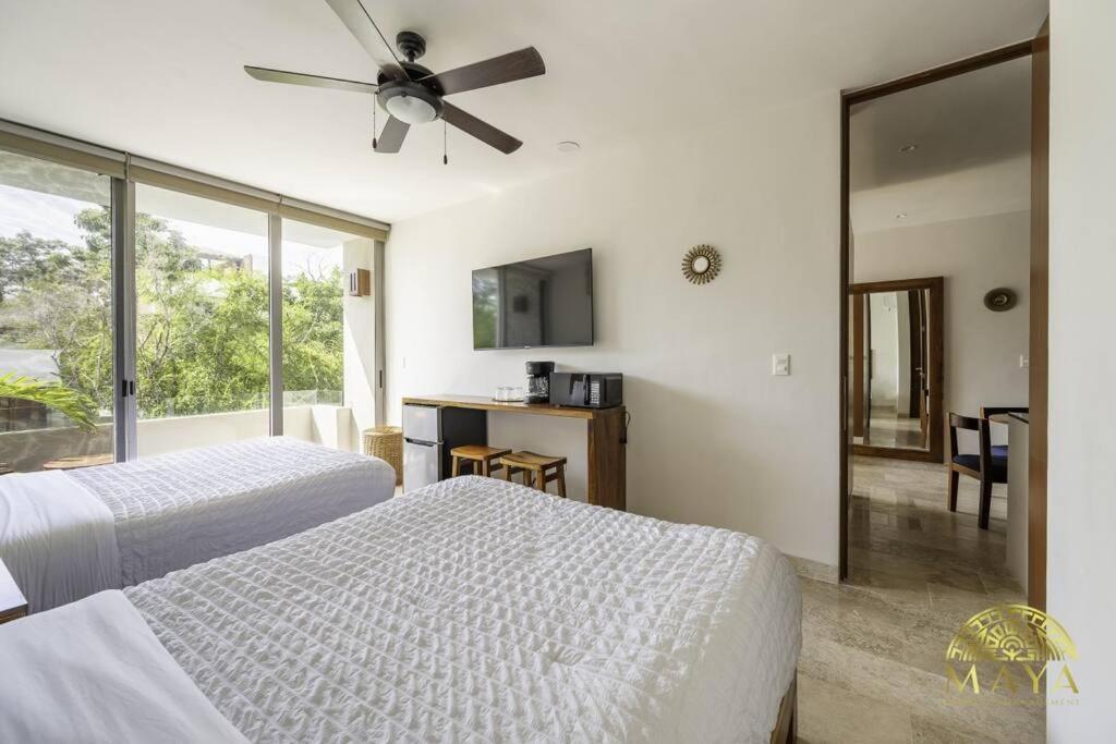 NHOA 205A Lux 2BR Condo Pool View in Aldea Zama, foto 16
