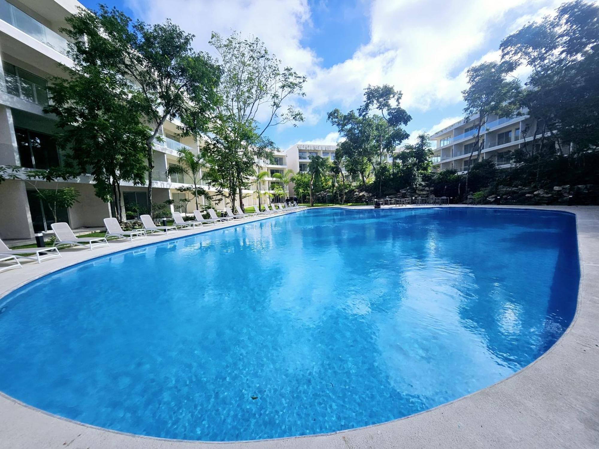 Modern Playacar Condo with Poolside Views & Nature