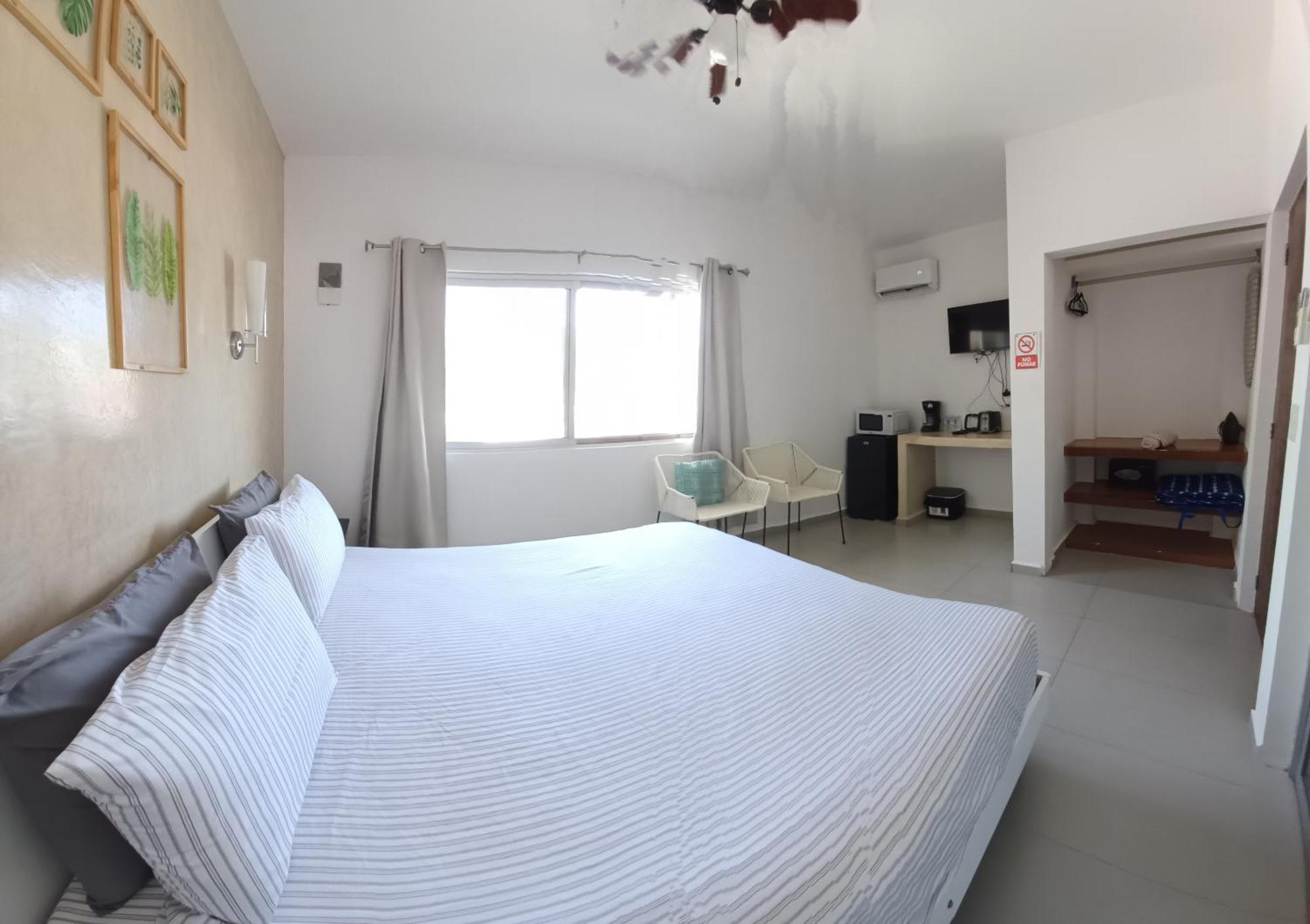 Casa Linda Isla-Room Palmera-Shared Pool, foto 12