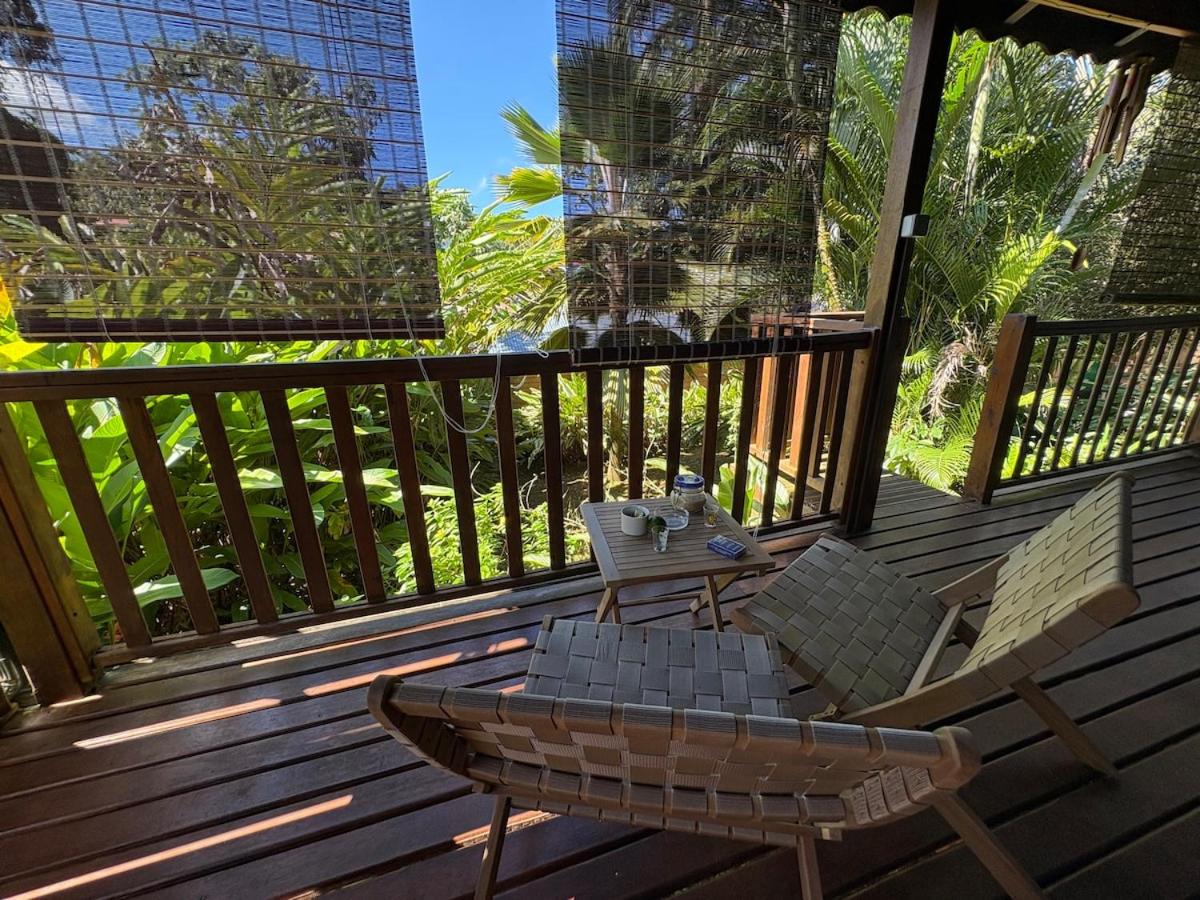 Bungalow dans un jardin tropical