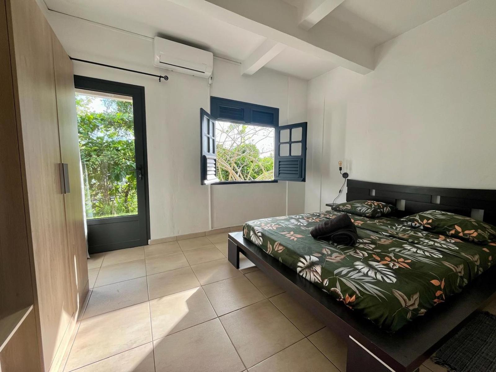 Évasion Créole Détente tropicale avec piscine, jacuzzi et plage à proximité!, foto 10