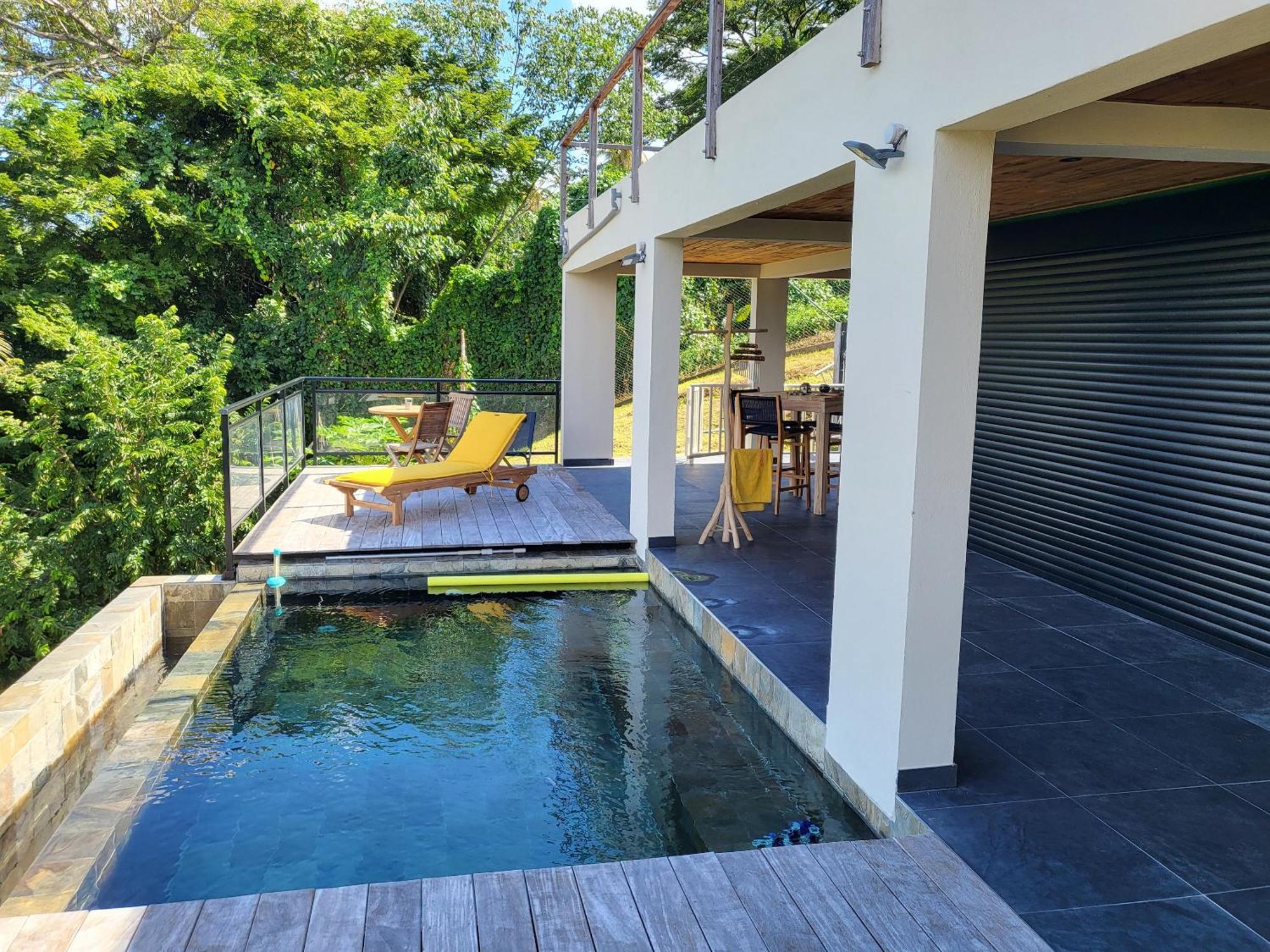 Appartement vue mer avec piscine privee a La Trinite 98m²
