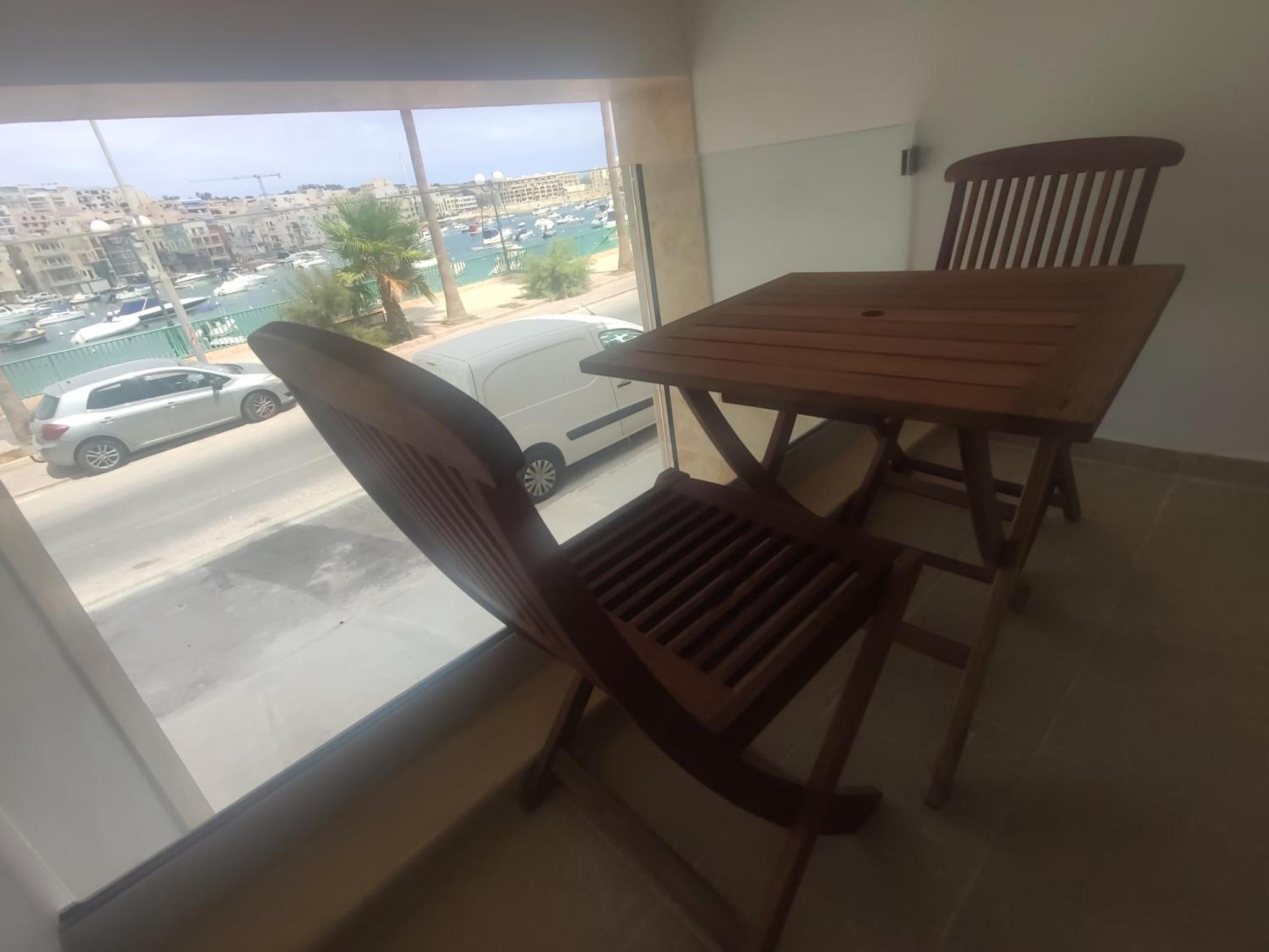 Aquamarine Sea Front Apartments - Elevated Ground Floor with Balcony And Yard