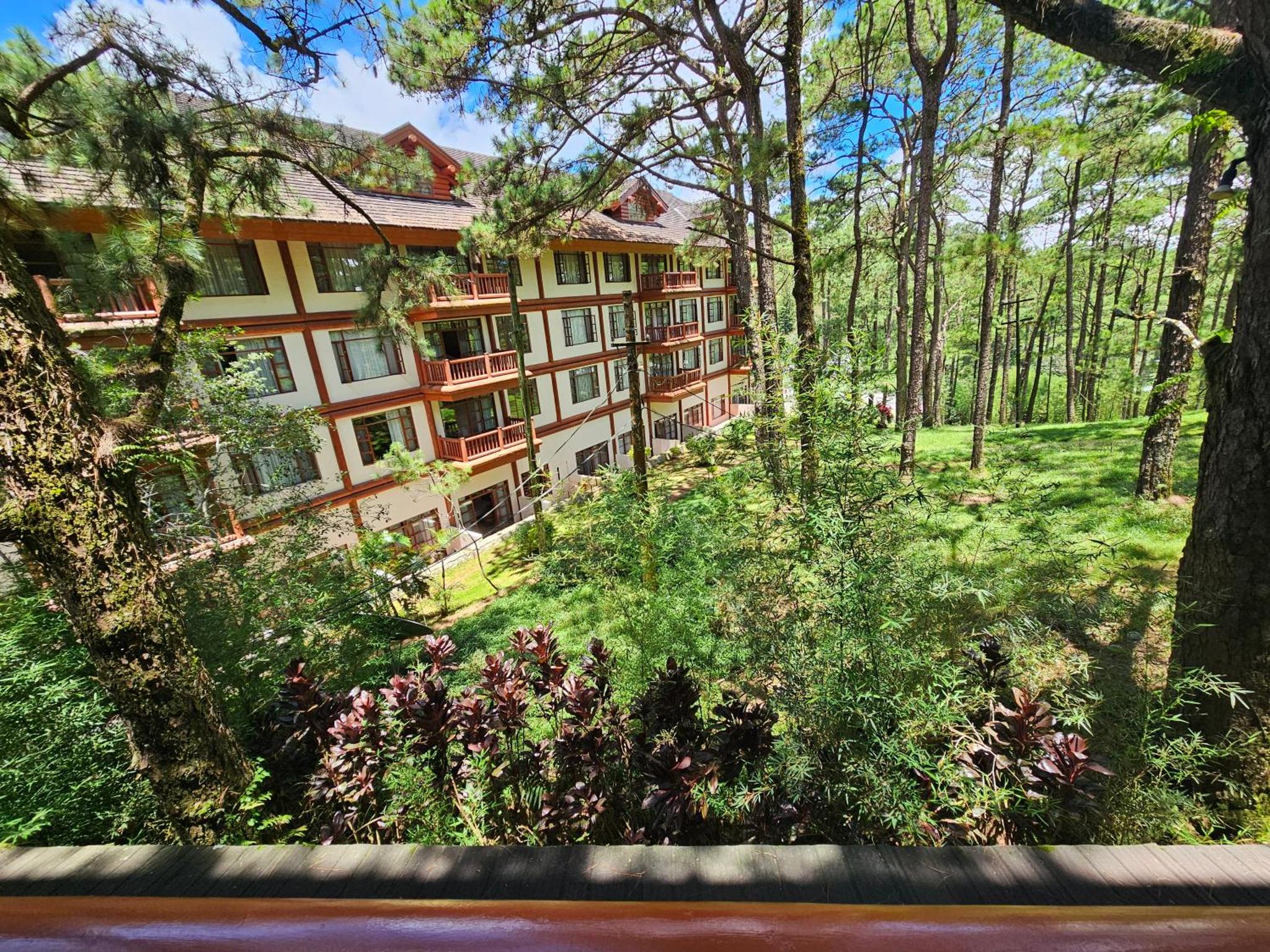 The Forest Lodge at Camp John Hay with balcony and parking privately owned unit 272