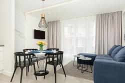 noclegi Rewal Apartament Klifowa z widokiem na morze i basenem