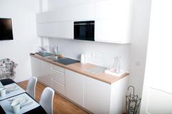 noclegi Pobierowo Apartament IKAR - 2 pokojowy przy morzu z własnym ogródkiem