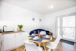 noclegi Poddąbie Apartament 1B Niebieskie Apartamenty Poddąbie z basenem krytym, odkrytym, salą zabaw, animacjami
