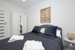 noclegi Kołobrzeg Tolles Familienapartment mit 3 Schlafzimmern einer Terrasse und Garage by Jantar Apartamenty