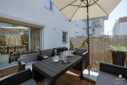 noclegi Kołobrzeg Tolles Familienapartment mit 3 Schlafzimmern einer Terrasse und Garage by Jantar Apartamenty