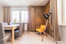 noclegi Jantar Bryza Jantar apartamenty z sauną & domki z kominkami