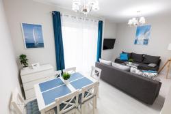 noclegi Rewal Apartament 7M z Basenem w jednym budynku Rewal, free private parking, Park rozrywki HOSSOLAND 30 minut