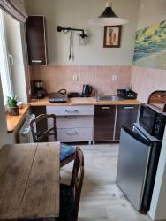 noclegi Kołobrzeg Apartament w Porcie Kołobrzeg latarnia morska plaża molo w zasięgu ręki