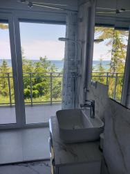 noclegi Gąski APARTAMENT BALTICHOFF PREMIUM with Sea View, Basen, Spa, Gym, Sauna, hala sportowa z kortem tenisowym