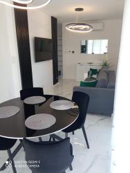 noclegi Rewal Apartament z bocznym widokiem na morze w kompleksie Hevenia