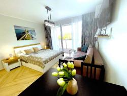 noclegi Kołobrzeg Apartment Superior Baltic with Terrace - FREE Pool, Saunas, Jacuzzi, Fitness, Salzgrotte