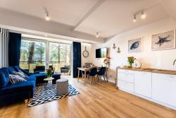noclegi Poddąbie Apartament 21B Niebieskie Apartamenty z basenem krytym, odkrytym, salą zabaw, animacjami