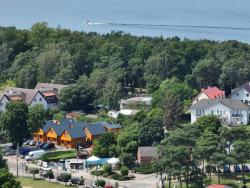 noclegi Pustkowo Słoneczne Domki Pustkowo, 1 minuta do plaży,