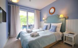 noclegi Kołobrzeg Apartamenty BalticON Polanki Park - Basen, Sauna, Siłownia, Sala zabaw dla dzieci inclusive