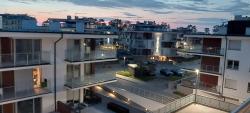 noclegi Rewal Apartament Olive Rewal z dostępem do basenu