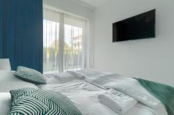 noclegi Niechorze Nadmorski Apartament z dostępem do basenu, sauny, jacuzzi i ogródkiem przy plaży 114 Rezydencja Niechorze