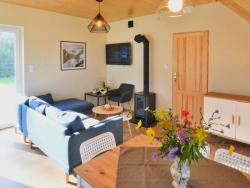 noclegi Osieki Holiday home with private garden close to the lake