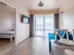 noclegi Krynica Morska Cozy, wooden holiday homes with terraces