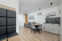 noclegi Kołobrzeg Exclusive and Modern Grey Apartment with Furnished Balcony in Kołobrzeg by Renters