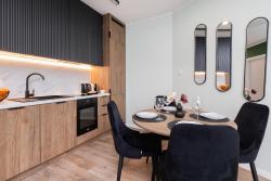 noclegi Gdańsk Green Apartment in Gdańsk with Free Access to the Gym and Parking by Renters