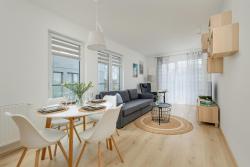 noclegi Dźwirzyno Cosy and Bright Apartment in Dźwirzyno with Furnished Balcony and Free Parking by Noclegi Renters