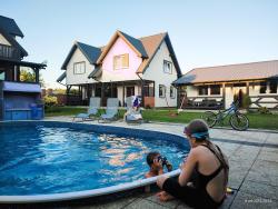 noclegi Rewal Luxury holiday homes with swimming pool, jacuzzi