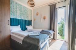 noclegi Rewal RResort Holiday Homes - HEATED Swimming Pool & Sauna