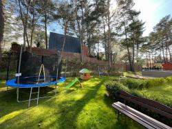 noclegi Jastrzębia Góra Apartament Pod Sosnami - basen, sauna, garaż, obok nadmorskiego lasu - Villa 4 Pory Roku