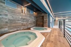 noclegi Kołobrzeg The Waves Apartamenty Kołobrzeg Kasprowicza 20C - Blisko plaży! - BEZPŁATNY PARKING PODZIEMNY - KLIMATYZACJA - Basen, jacuzzi, sala fitness, sala zabaw dla dzieci i sauny w cenie!
