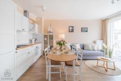 noclegi Sztutowo Flatbook Apartamenty - Przystań Cztery Pory Roku Sztutowo z bilardem i parkingiem