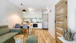 noclegi Jantar JANTAR RESORT Apartamenty PIAMOLA ze strefą sportową i grillem