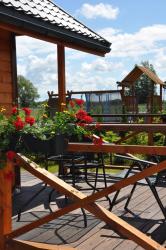 noclegi Rusinowo Domek parterowy klimatyzowany, ogrzewany z jacuzzi na terenie ośrodka- Domki u Staszka